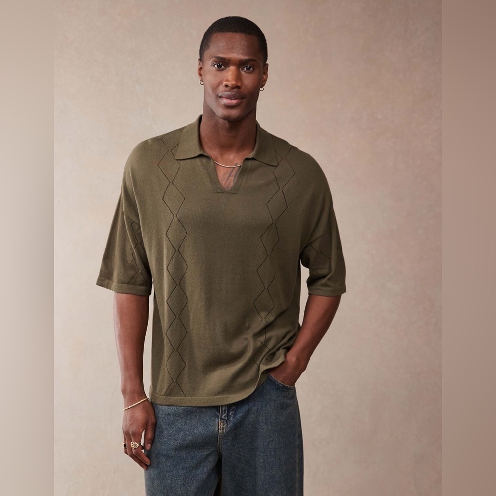 ASOS DESIGN relaxed knit notch neck polo shirt with pointelle pattern